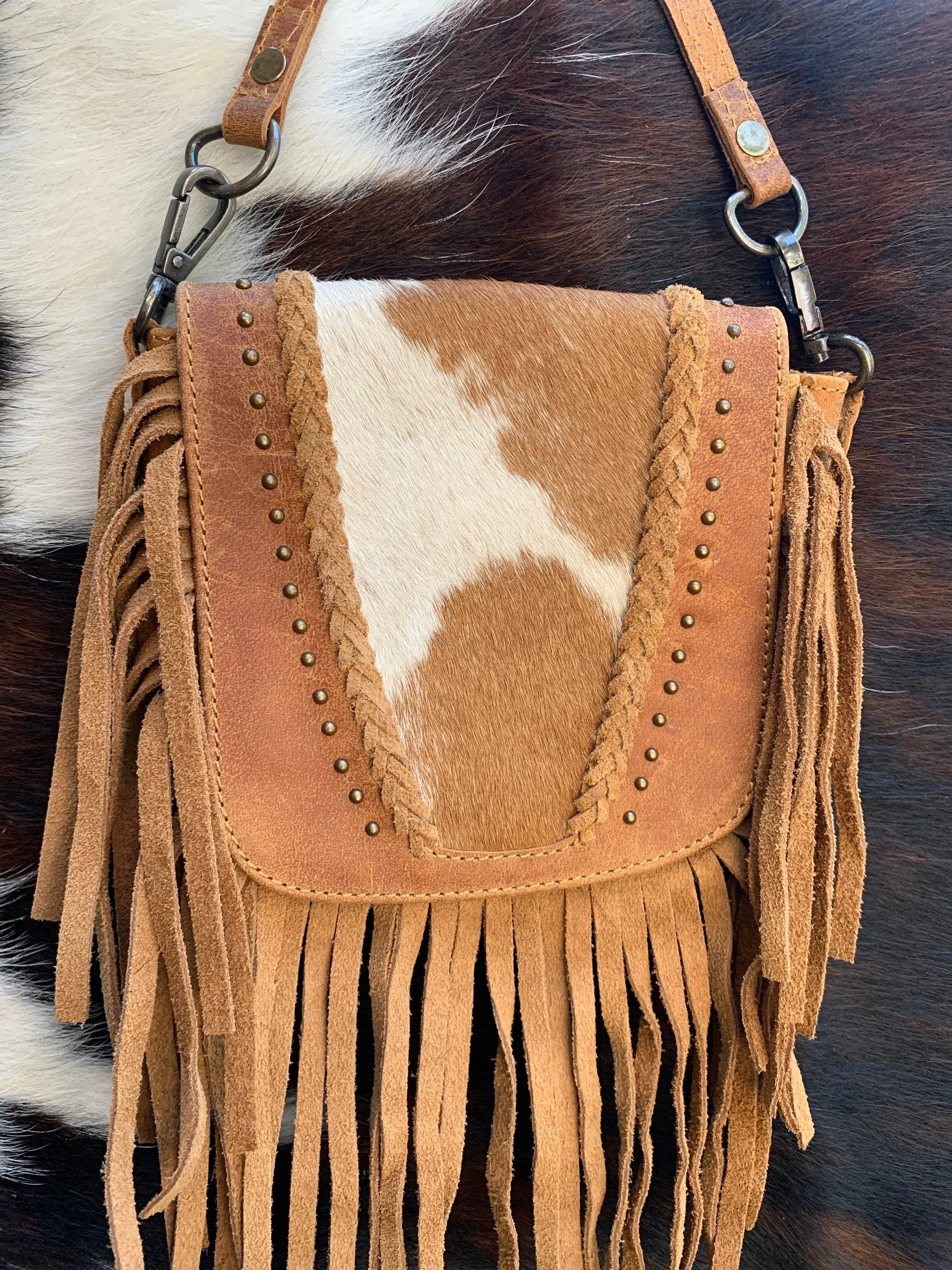 Cowhide crossbody and hipster purse